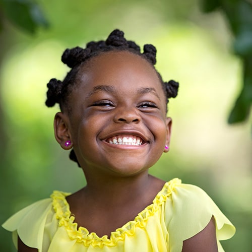 Girl smiling at Smile Arc Pediatric Dentistry in San Diego, CA
