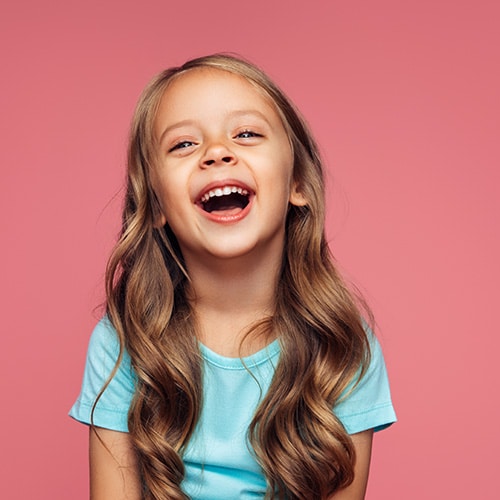 Girl laughing at Smile Arc Pediatric Dentistry in San Diego, CA