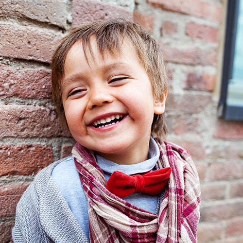 Boy smiling at Smile Arc Pediatric Dentistry in San Diego, CA
